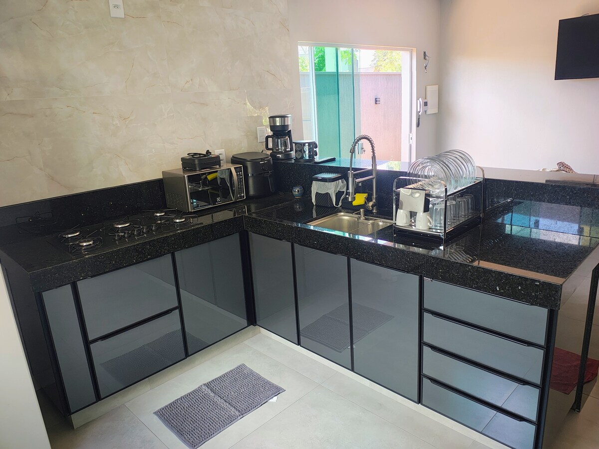 Airbnb em destaque: Marcos' House House with air conditioning and hydro em Capitólio