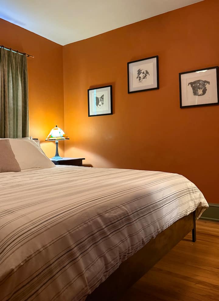 King size bed, Curated art.