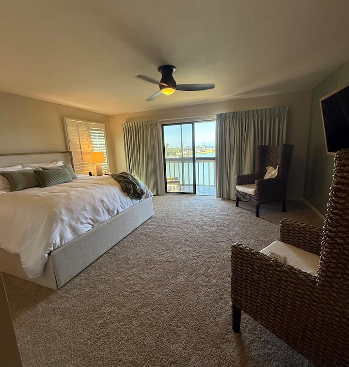 From the balcony enjoy beautiful lake views from the screened-in balcony with a clear view of the Emerald Coast in the distance.