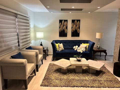 Spacious 5 bedroom house with A/C and private bathrooms