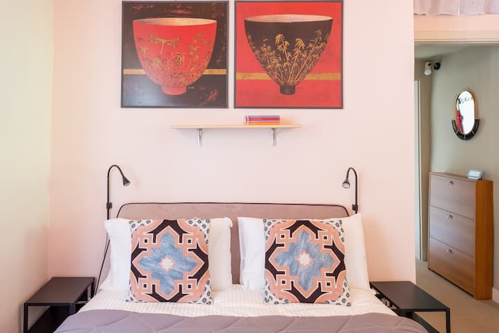 Bedroom is equipped with electric outlets on both sides of the bed - easy to plug in your chargers for the night.