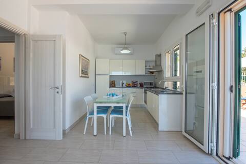 Successful Airbnb property: Air-conditioned apartment; breathtaking terrace 60m from the sea in Tertenia