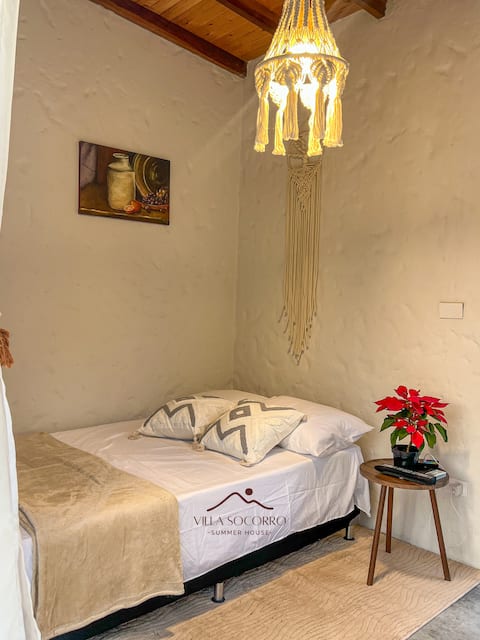 Successful Airbnb property: Santorini glamp with Jacuzzi and air conditioning near Santafe in Sopetrán