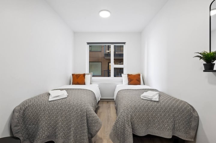 Bedroom with two comfortable beds ️, fresh sheets & pillows, and your own clothing storage 