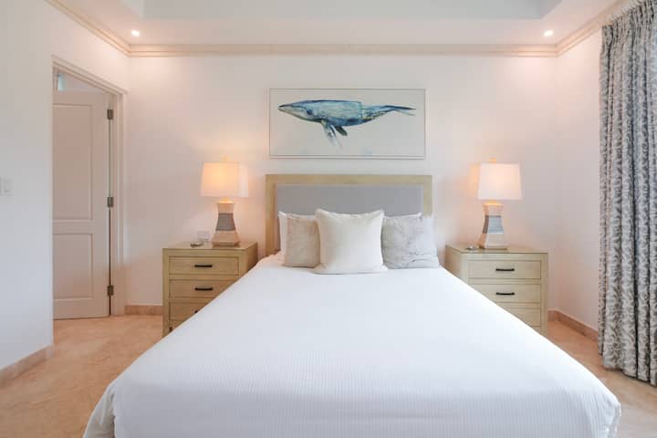 Bedroom three with en suite, air conditioning, ceiling fan, smart TV, wardrobe.