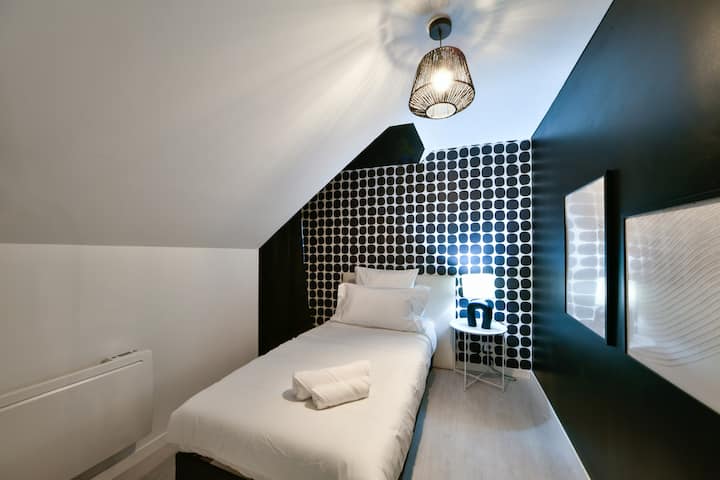 ห้องนอนพร้อมเตียงเดี่ยว 