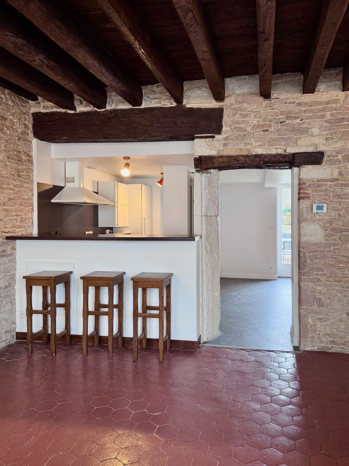 Salon ouvert sur la cuisine