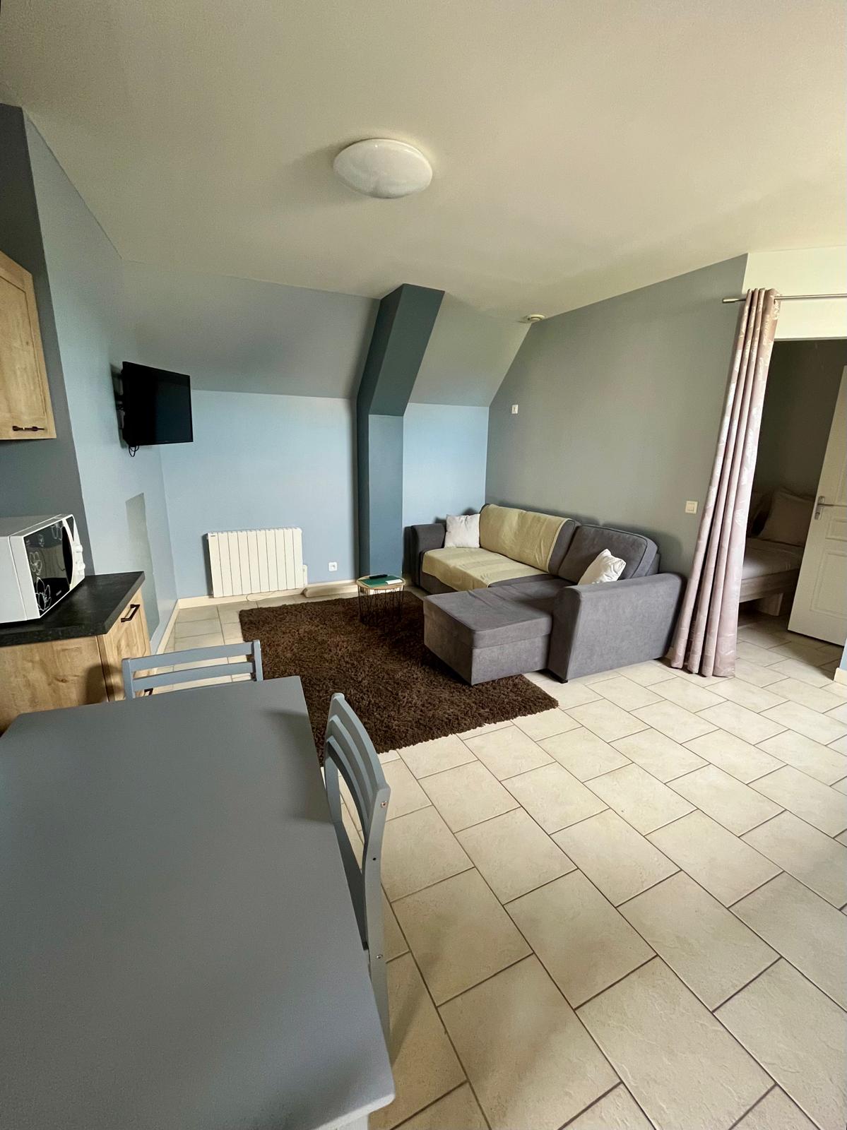Woonkamer met keukenhoek