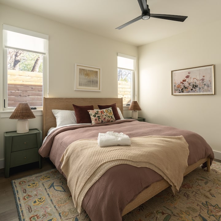Downstair king bedroom with own tv and dresser.