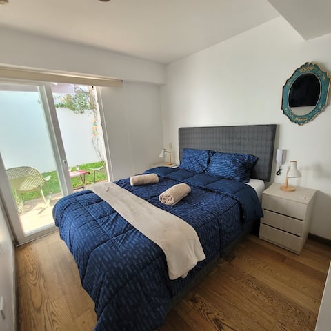 Suite with private bathroom, office, terrace and garden.