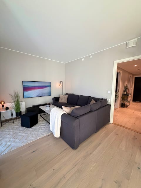 Successful Airbnb property: New and Comfortable apartment in Åsane with parking in Åsane