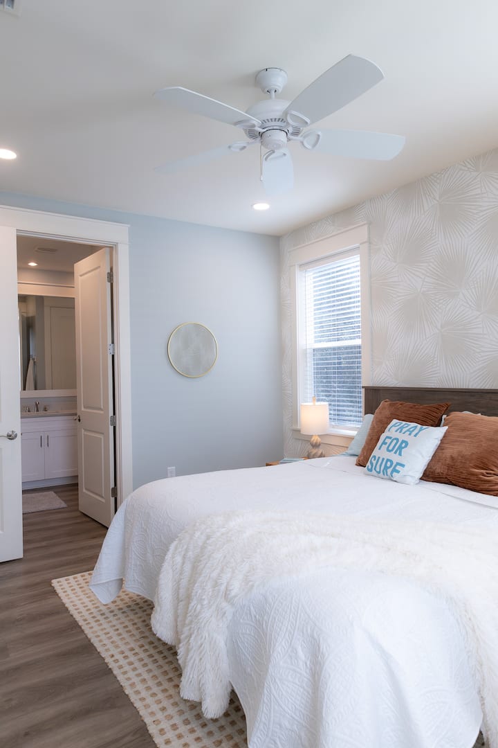 "Surf's Up" bedroom with nearby ensuite — comfort and ease.