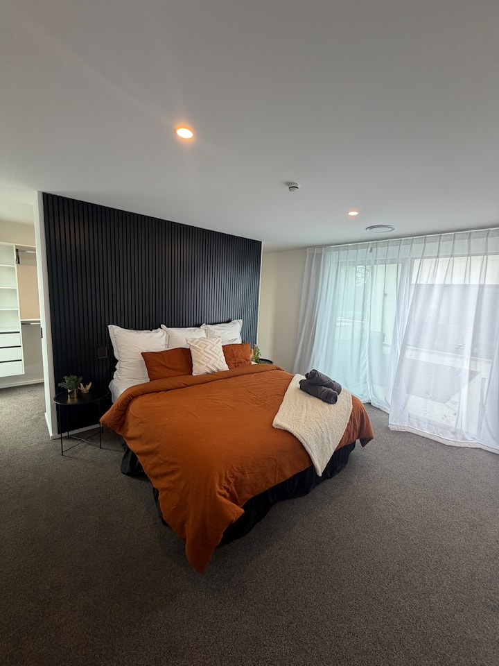 Superking bed with walk in wardrobe behind the bed and ensuite 

Can easily fit another bed or mattress in here if needed.