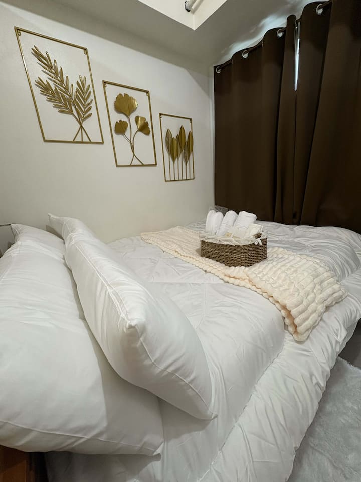 Clean, cozy, and comfy king bed with hotel quality linens