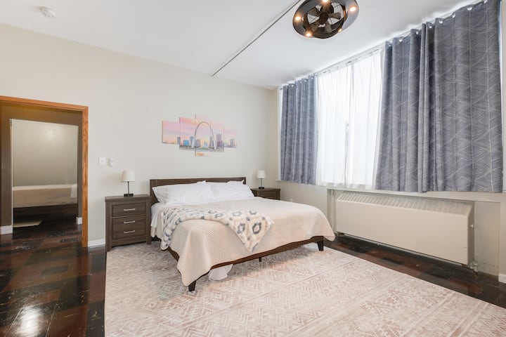 King size bed in the master bedroom along with bedside tables and lamps with plug in to charge your devices.