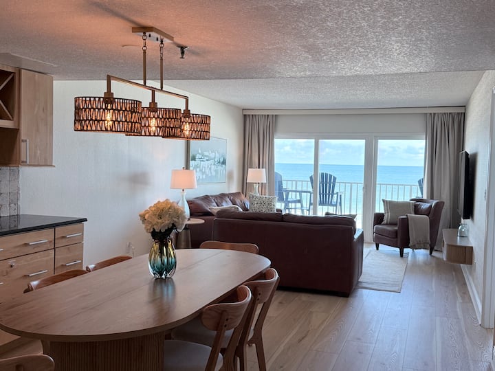 Balcony dining space overlooking the beach