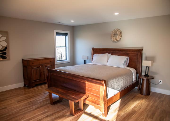 High end king sized bed in the master suite.