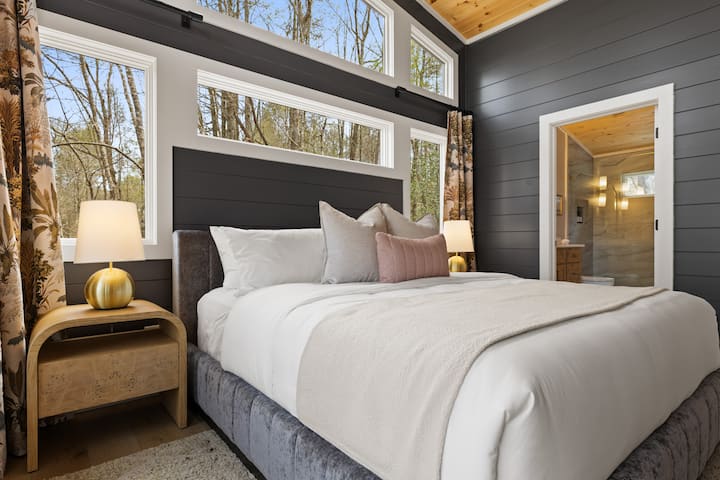Welcome to the English Garden Suite: The second main floor king suite overlooks the creek and has its own private bathroom.