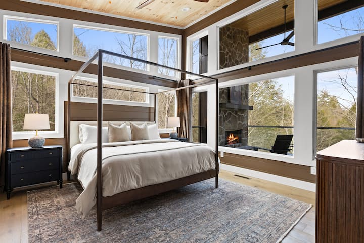 Welcome to the Woodland Haven Suite: This king suite is a stunning sanctuary with luxury bedding and windows that open to the soothing sound of the creek below. 