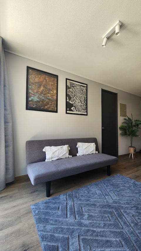 Popular Airbnb listing: Cozy Apartment + A/C | Steps from Santander Arena. in Santiago