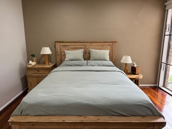 Cama tamaño queen
