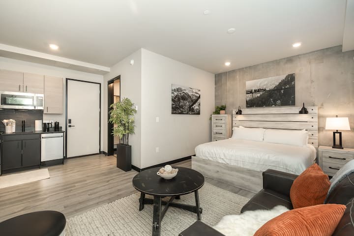Sleep in comfort in a large king bed and cozy up with high-thread count cotton sheets. Multiple types of pillows included for personal preference. Linens and bedding are professionally laundered after every guest.