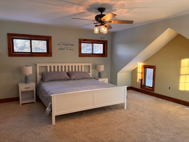 This bedroom is located upstairs. It also has a daybed that converts into another king-sized bed so this room can sleep four. 