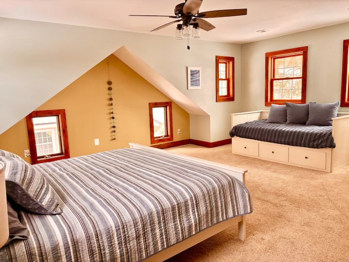 This spacious room has a king bed and the day bed is an IKEA pull out that coverts into a king.
