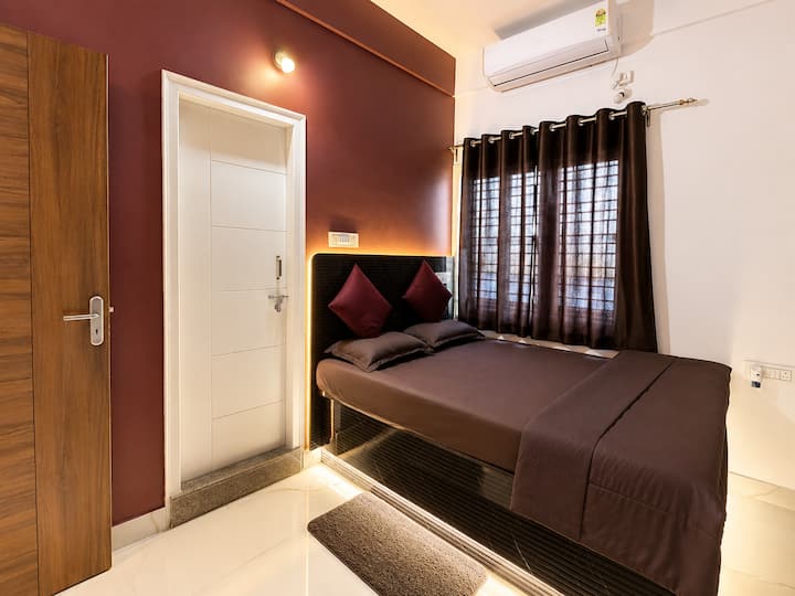 Modern bedroom (9.10 feet by 11 feet) + Closet + Study Table + Attached Bathroom