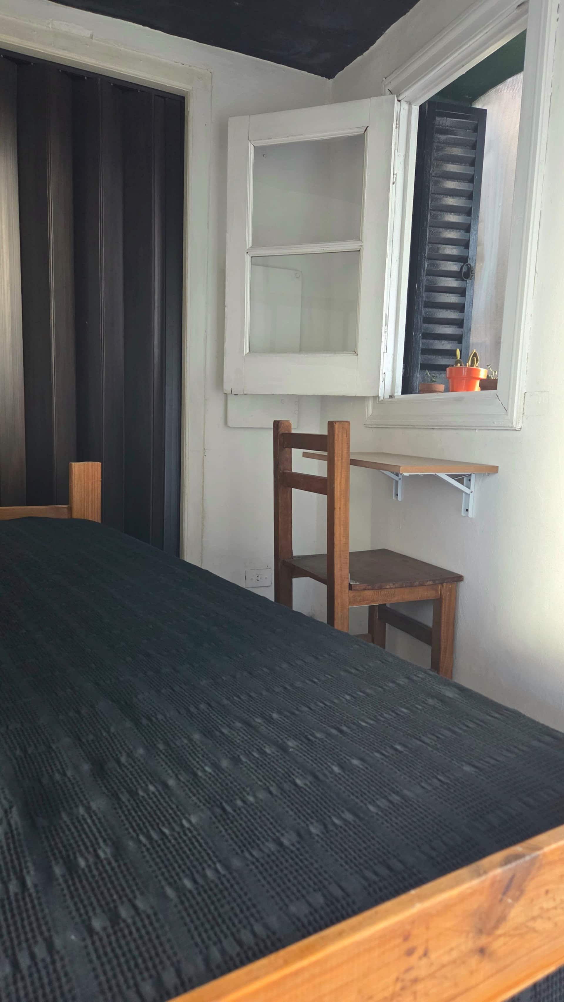 Quarto com banheiro privativo em Chacarita