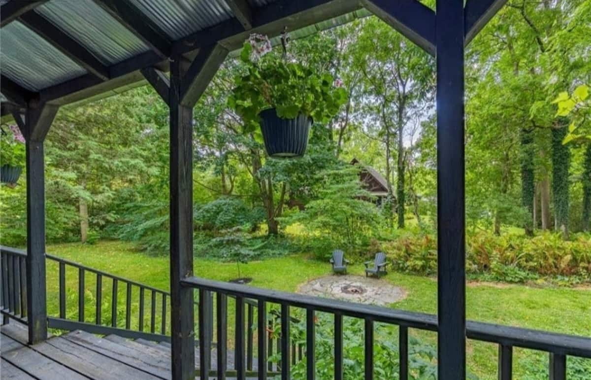 Exterior — Heritage cottage surrounded by mature trees