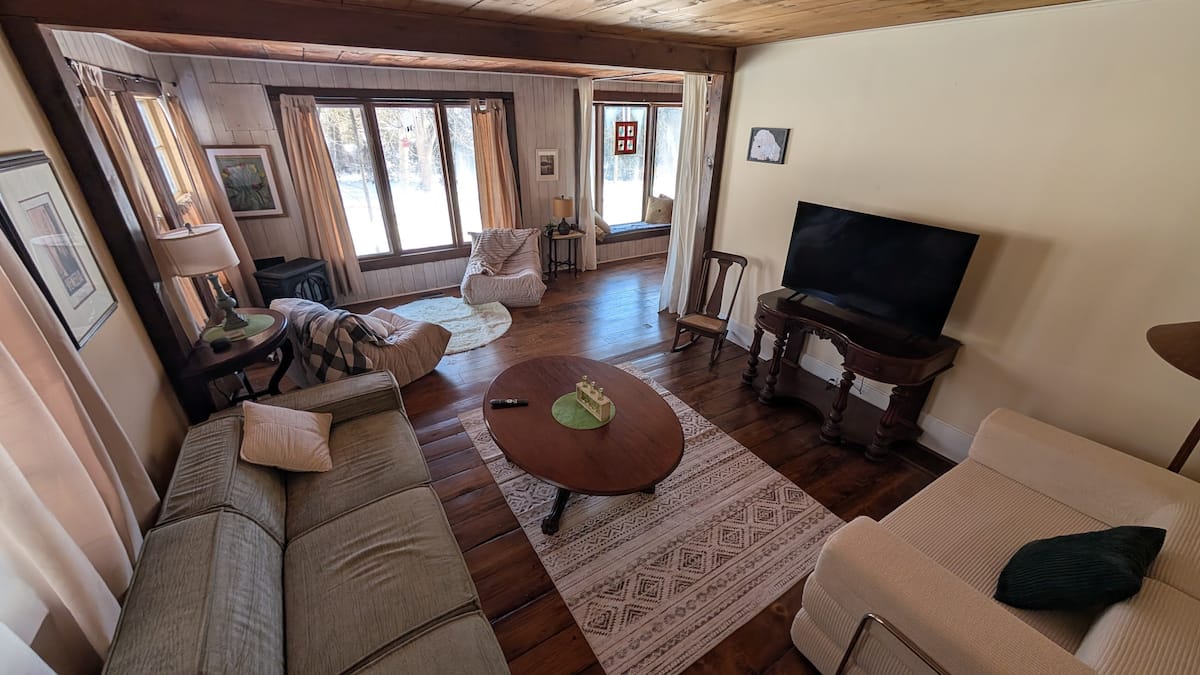 Bedroom with queen bed and natural light