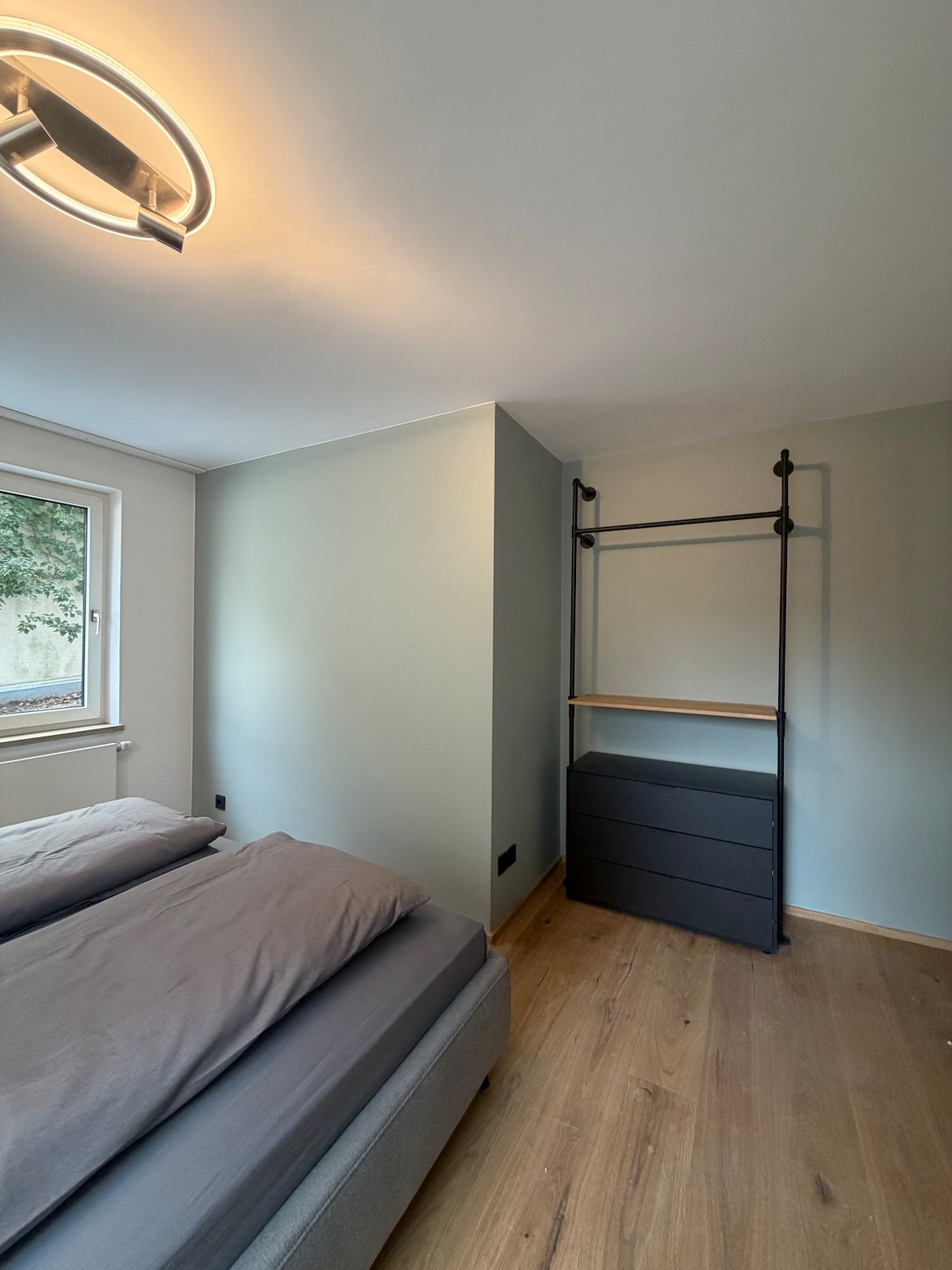 Quiet apartment with designer interior, garden and underground garage