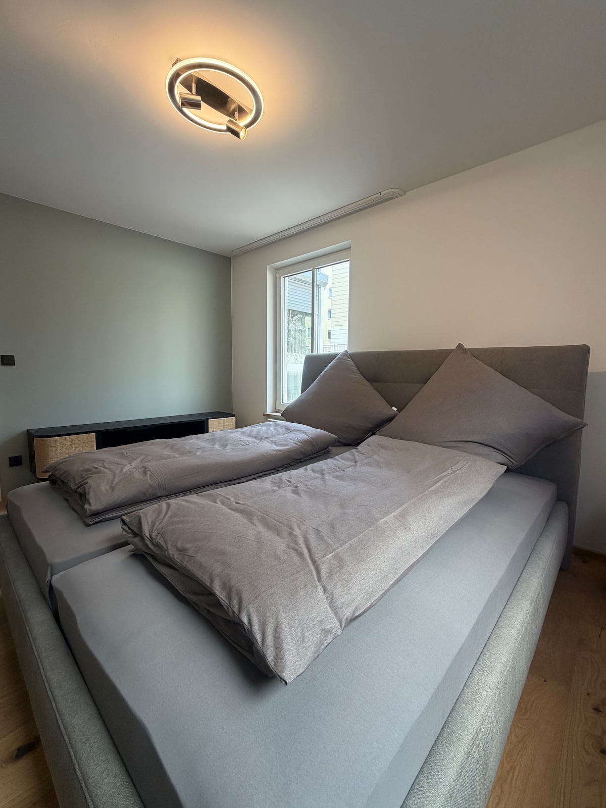 Quiet apartment with designer interior, garden and underground garage