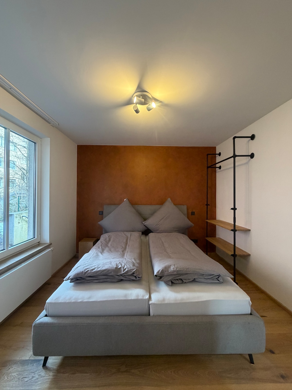 Quiet apartment with designer interior, garden and underground garage
