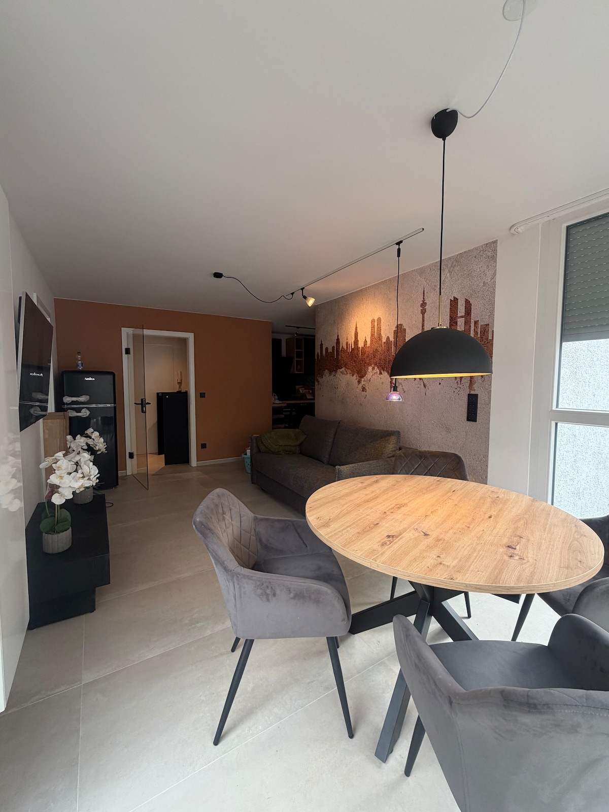 Quiet apartment with designer interior, garden and underground garage