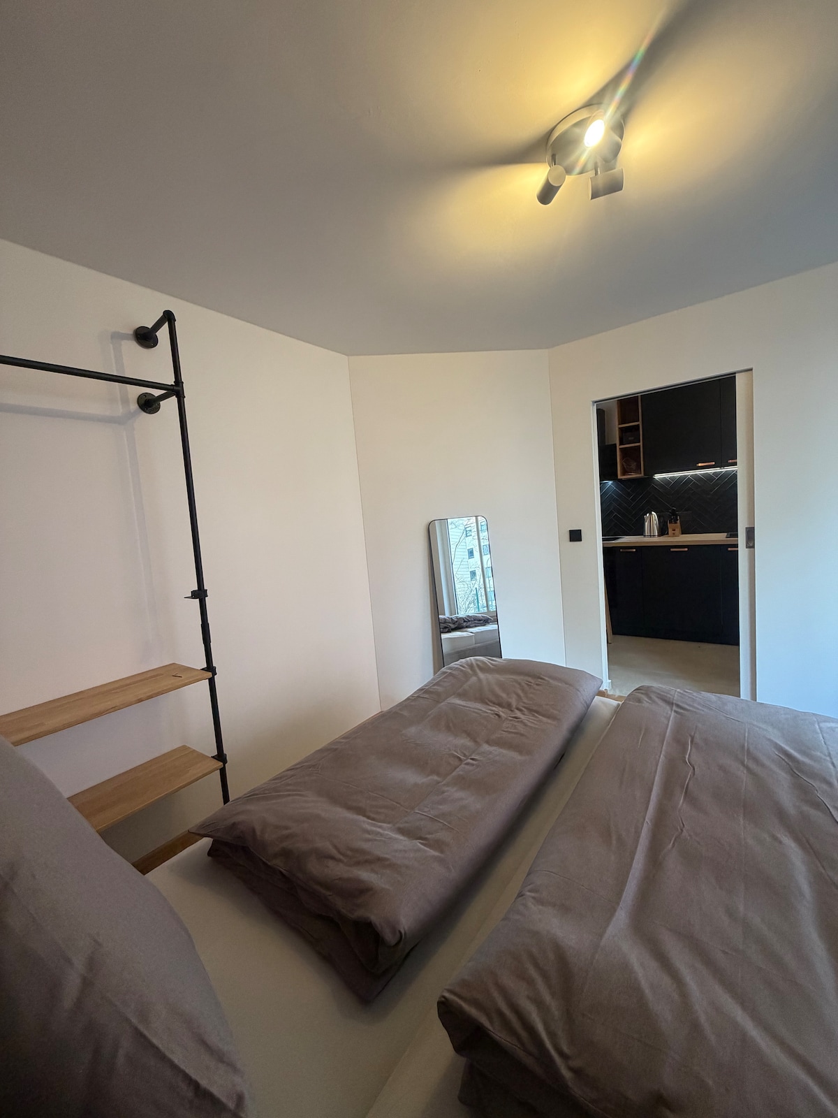 Quiet apartment with designer interior, garden and underground garage