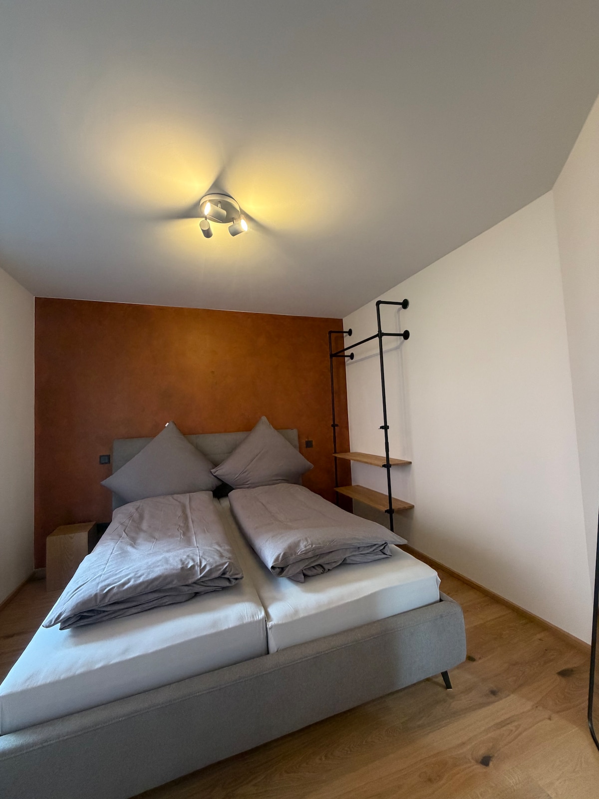 Quiet apartment with designer interior, garden and underground garage