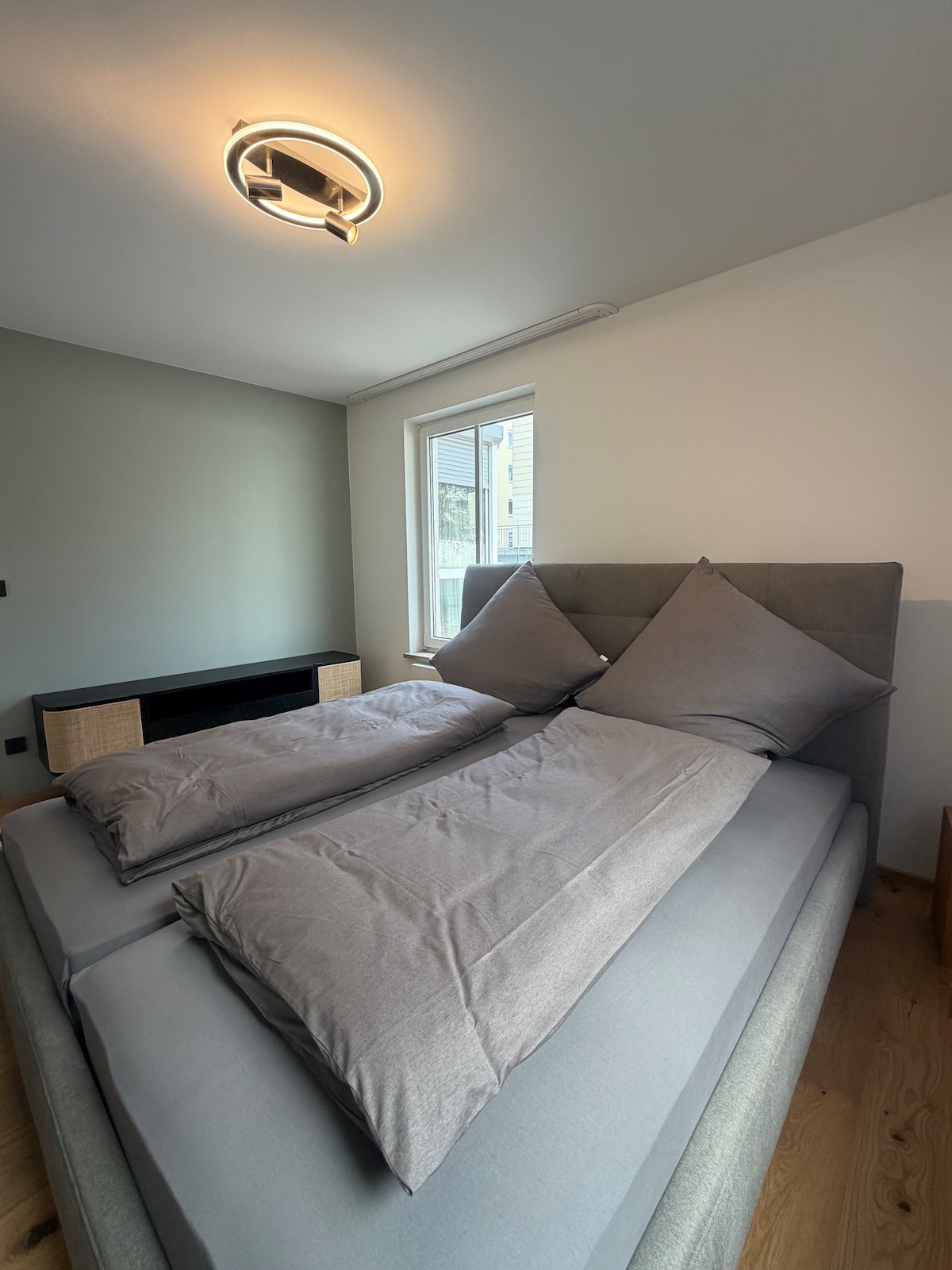 Quiet apartment with designer interior, garden and underground garage