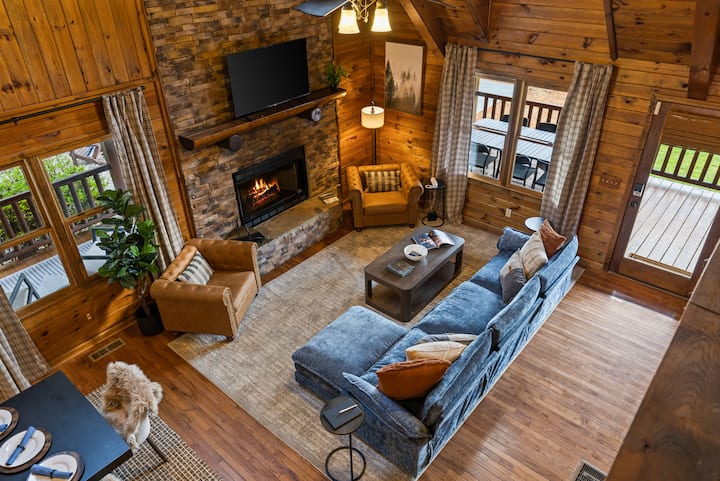 Enjoy a stunning bird’s-eye view from the loft overlooking the warm, inviting living space below.