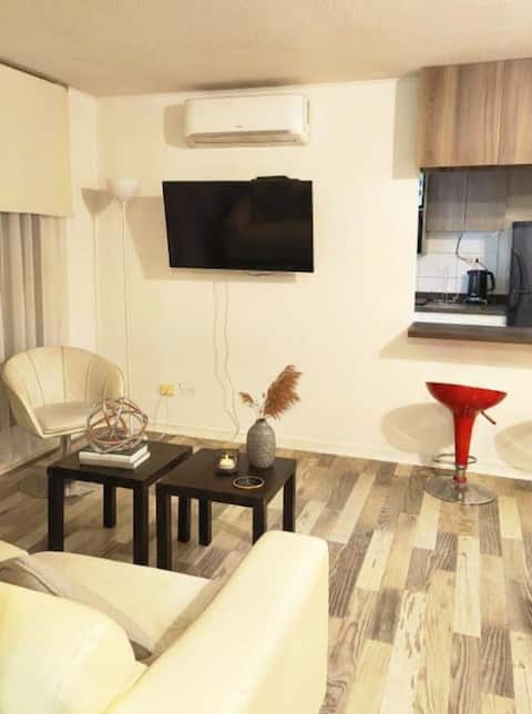 Top performing Airbnb: Warm Downtown Apartment for Family/Work, Wi-Fi + A/C + Parking in Talca