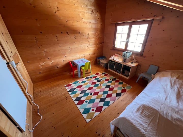 The children bedroom contains one bed suitable for a single adult / child and another bed only suitable (because of the mattress) for children. 
Some child toys are available! 