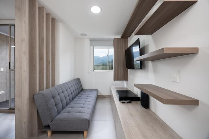 Home Cinema & Total Comfort. Enjoy an immersive experience with Sony surround sound (ceiling-mounted speakers) and a 55-inch Smart TV. Relax on our premium sofa, which easily converts into a bed for extra guests.
