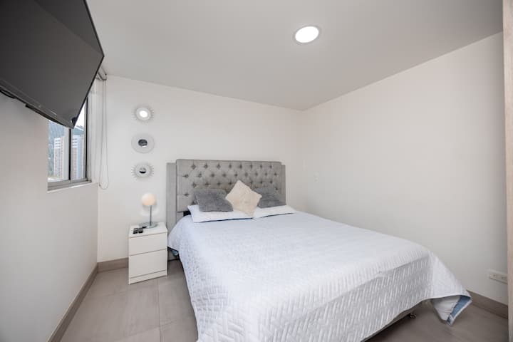 Bedroom number 1 has a 55-inch LG TV 
