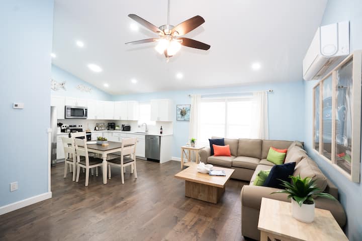 Living Room, Kitchen, and Dining Area.