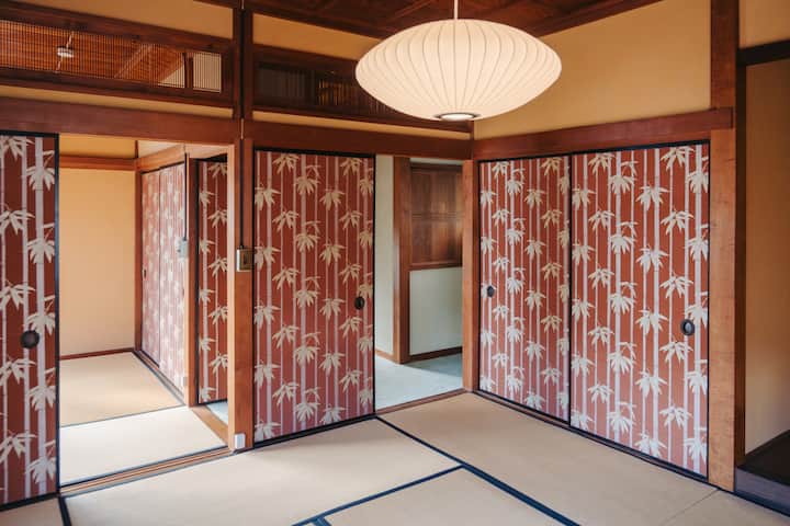 Two tatami bedrooms are separated by custom Edo-karakami fusuma doors 