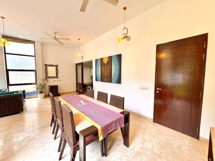 A sunlit, spacious dining area designed for relaxed meals and memorable gatherings.