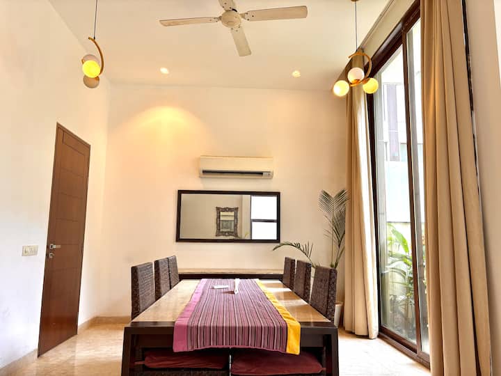 Expansive sun-drenched dining area perfect for group meals and intimate dinners alike.