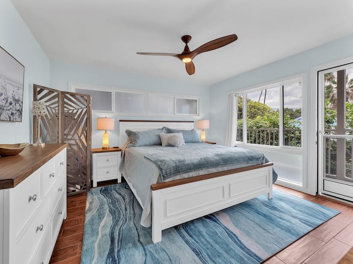 New King bed with new high end mattress, box springs, all new furniture including dresser, end tables. All new decor, lighting, new quartz counters on built in desk, built in cabinets, closet, private door to outside for more air flow, light & waves