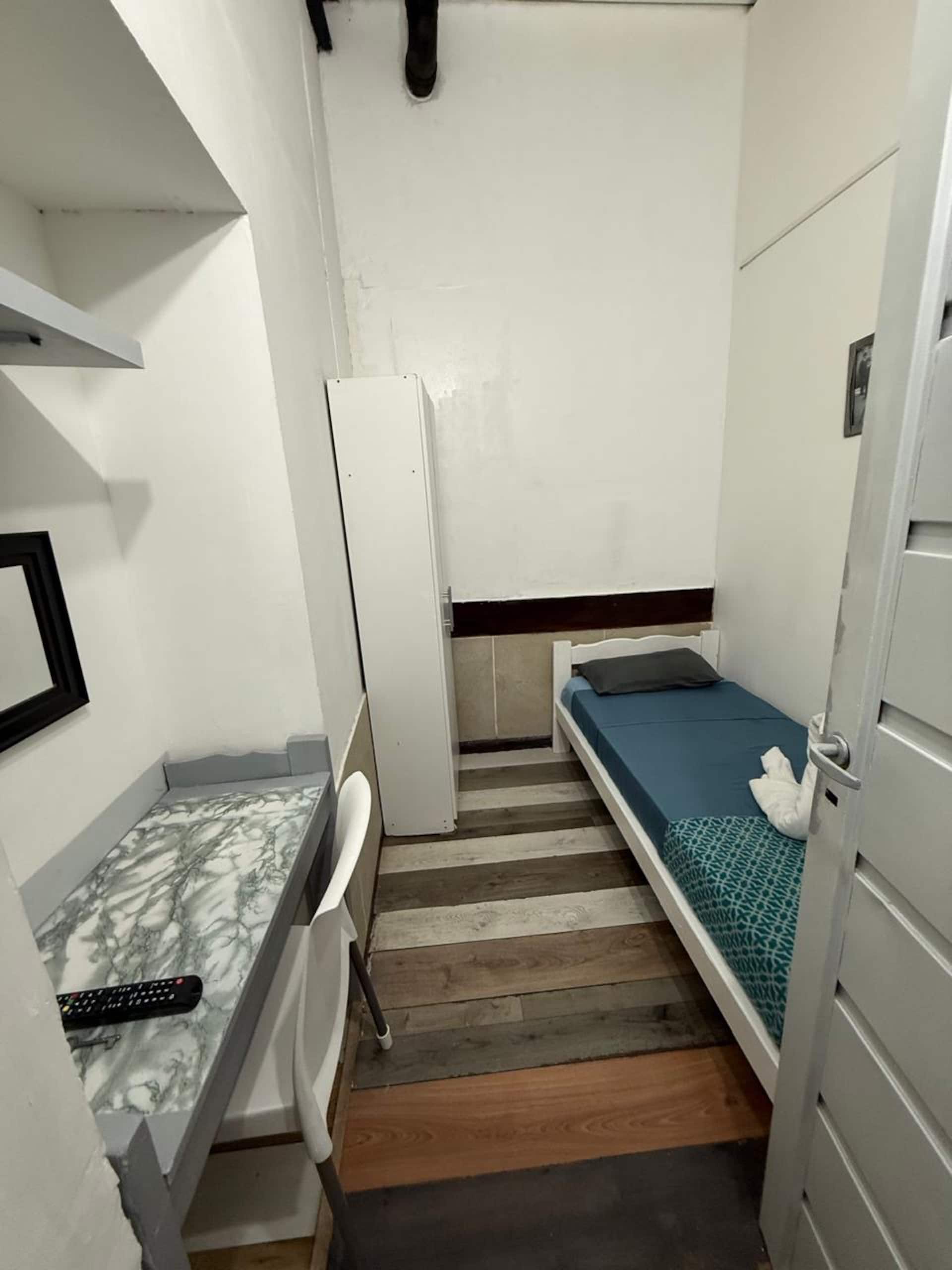 Quarto em economia de estada em Palermo